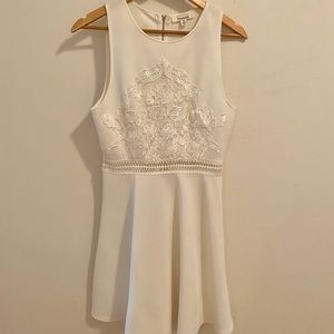 White dress with peekabo waistline